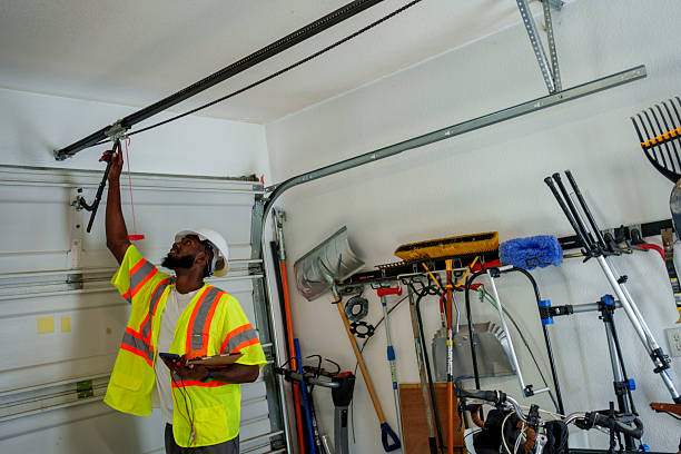 Professional Garage Door Panel Replacement technician working in South Boston, VA